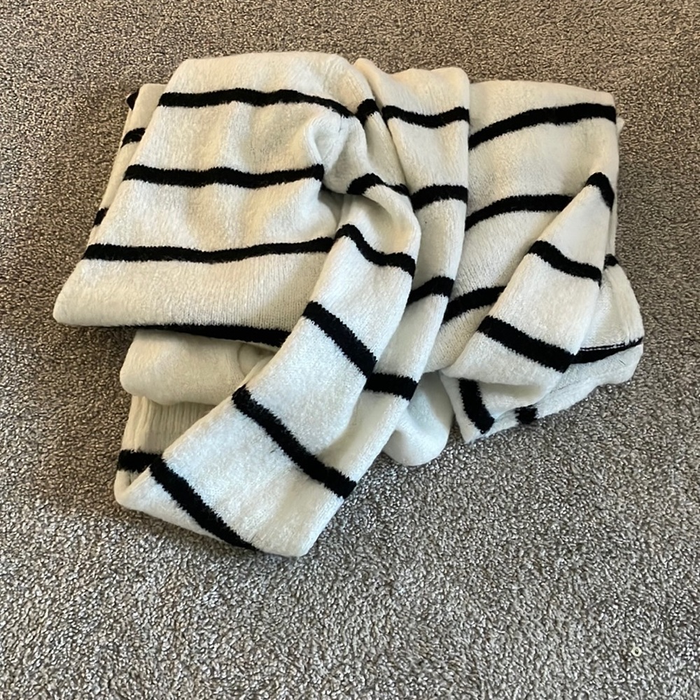 folded up striped cardigan with hoodie